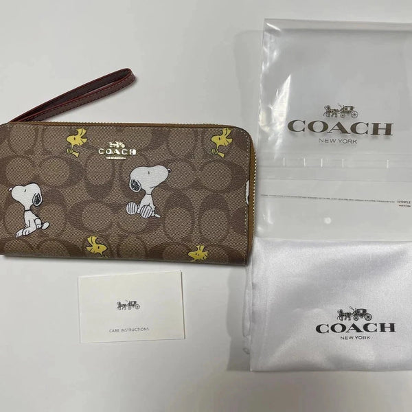 COACH x Peanuts Long Zip Around Wallet Snoopy Woodstock Khaki Signature Canvas