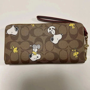 COACH x Peanuts Long Zip Around Wallet Snoopy Woodstock Khaki Signature Canvas